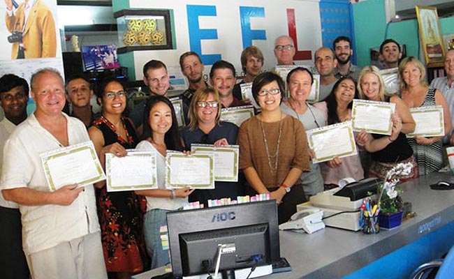 Graduates with their certificates.